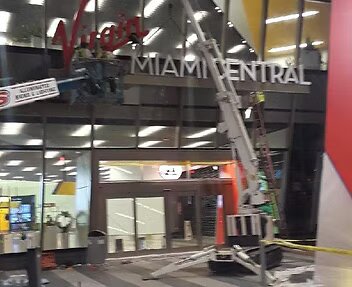Cooper Crane mini spider crane at the Virgin MiamiCentral station entrance